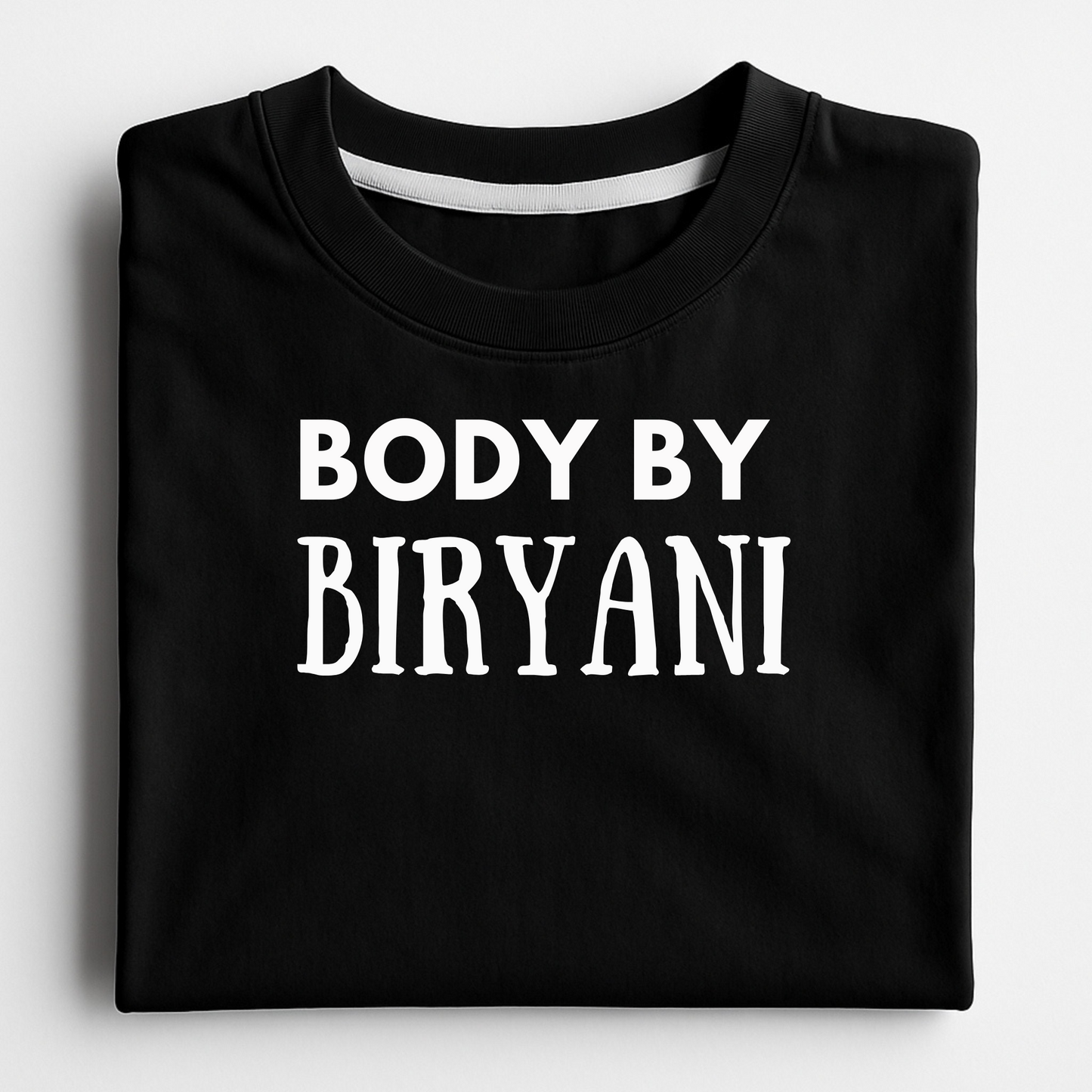 Black t-shirt with 'BODY BY BIRYANI' text on a white background