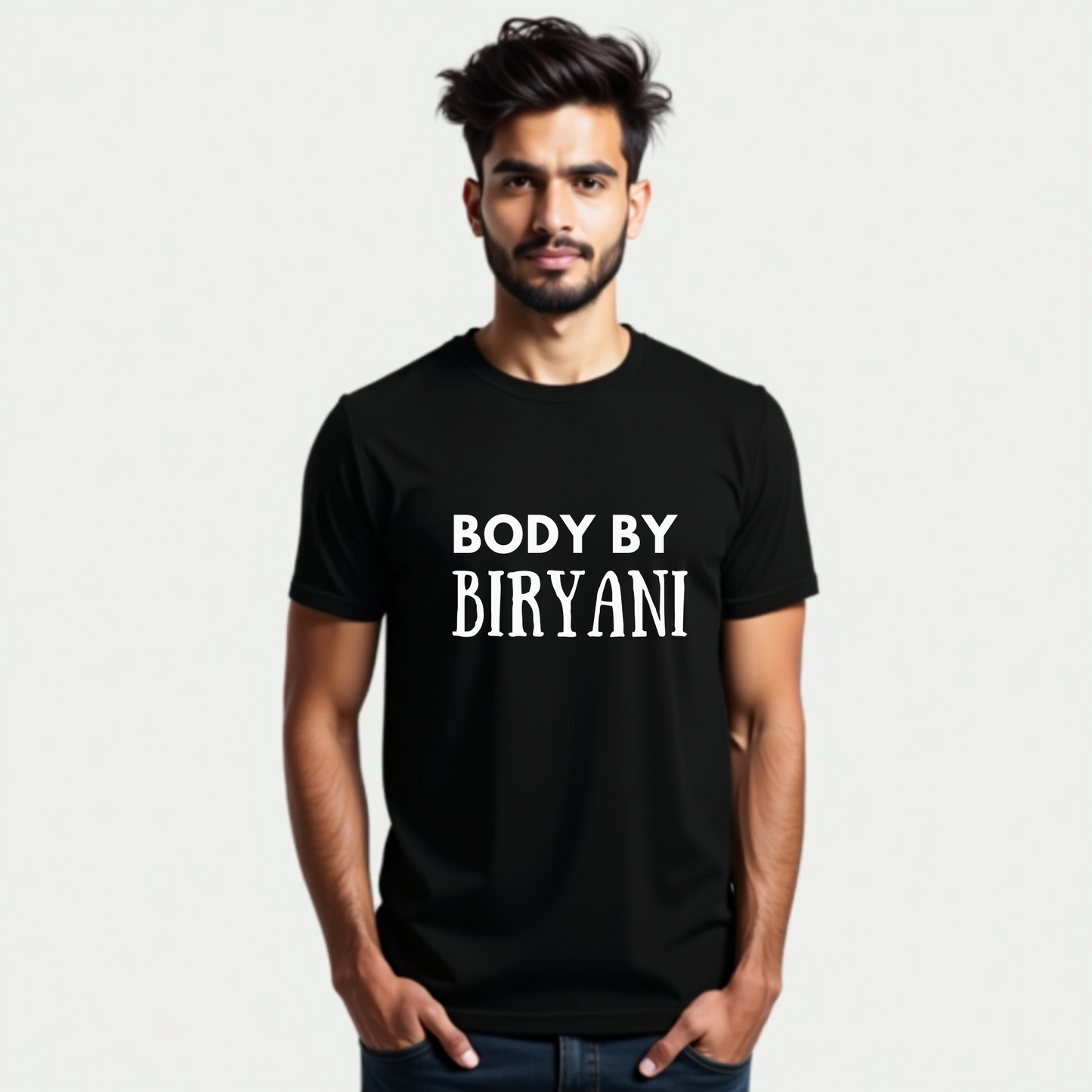 Man wearing a black t-shirt with 'BODY BY BIRYANI' text on a plain background