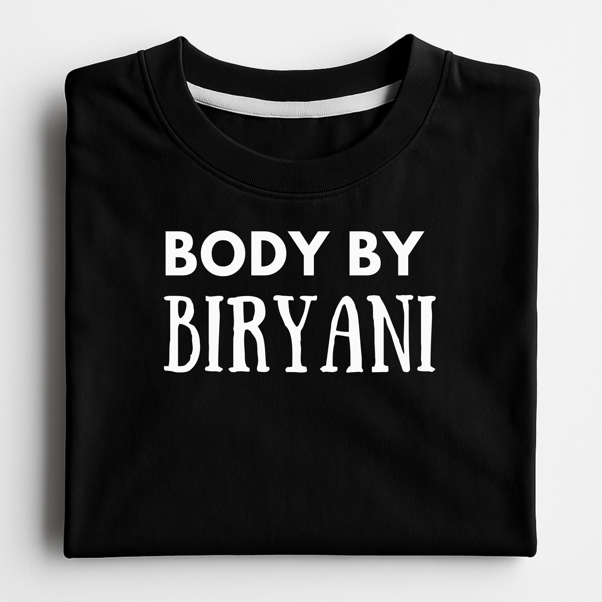 Black t-shirt with 'BODY BY BIRYANI' text on a white background