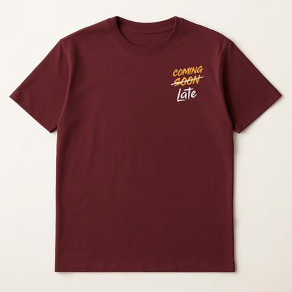 Maroon t-shirt with 'COMING SOON Late' text on a beige background