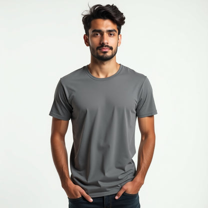Man wearing a gray t-shirt against a plain background