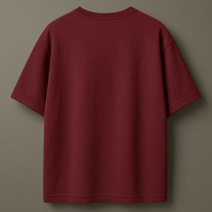 Maroon t-shirt on a brown background